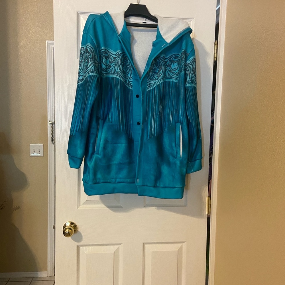 Men's Teal Performance Jacket with hoodie.